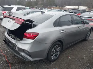 2024 Kia Forte LXS with VIN 3KPF24ADXRE820491, listed as a IAAI auction lot 41526871 with 5,675 mi miles and . Bid and sale history available at DreamBid. Image 4.