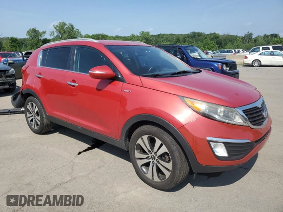 2011 Kia Sportage EX with VIN KNDPCCA27B7079569, listed as a Copart auction lot 62072015 with 156,569 mi miles and Salvage title. Bid and sale history available at DreamBid. Image 4.