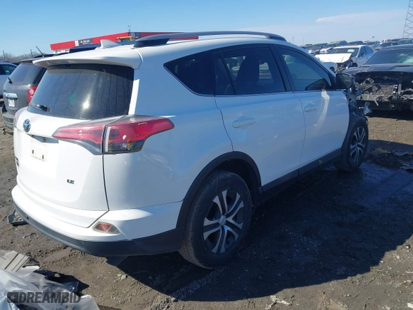 2017 Toyota RAV4 LE with VIN JTMZFREV8HJ111318, listed as a IAAI auction lot 41649660 with 117,018 mi miles. Bid and sale history available at carsss.com. Image 4.