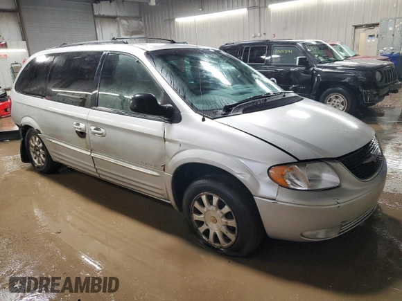 2001 Chrysler Town & Country LXi with VIN 2C8GP54L31R375236, listed as a Copart auction lot 85763534 with 193,013 mi miles and Salvage Title. Bid and sale history available at DreamBid. Image 4.