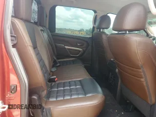 2017 Nissan Titan Pro-4X z VIN 1N6BA1F43HN562363, wystawiony jako Copart lot #58604115 z przebiegiem 102 412 mil mil oraz Czysty tytuł • Clean title. Historia ofert i sprzedaży dostępna na DreamBid. Obrazek 10.