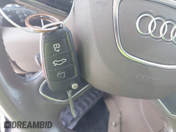 2015 Audi Q7 S line Prestige with VIN WA1DGAFE9FD004677, listed as a IAAI auction lot 42590832 with 150,143 mi miles and . Bid and sale history available at DreamBid. Image 11.