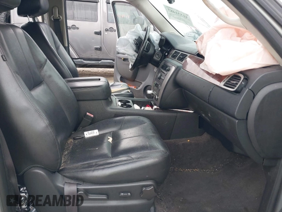2014 GMC Yukon XL SLT with VIN 1GKS1KE08ER188302, listed as a IAAI auction lot 41531485 with 196,810 mi miles. Bid and sale history available at carsss.com. Image 5.