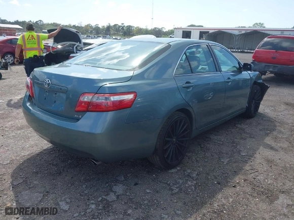 2009 Toyota Camry with VIN 4T1BE46KX9U887960, listed as a IAAI auction lot 41727053 with 130,300 mi miles. Bid and sale history available at carsss.com. Image 4.