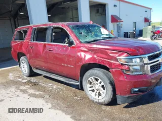 2019 Chevrolet Suburban LT with VIN 1GNSKHKC7KR226017, listed as a IAAI auction lot 42608510 with 124,577 mi miles and . Bid and sale history available at DreamBid. Image 1.