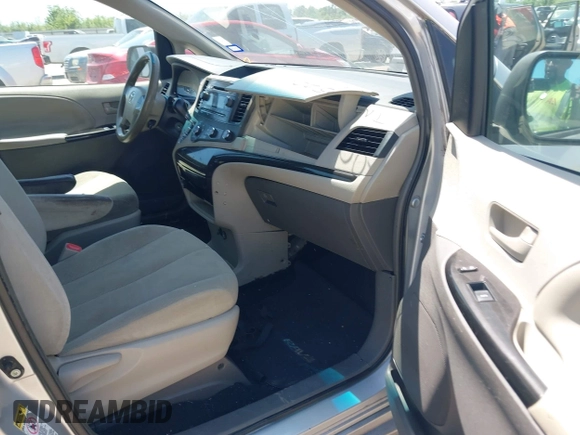 2014 Toyota Sienna L with VIN 5TDZK3DC1ES410012, listed as a IAAI auction lot 42005001 with 440,789 mi miles. Bid and sale history available at carsss.com. Image 5.