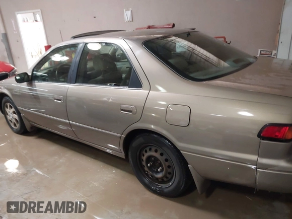 1999 Toyota Camry LE z VIN JT2BF28K7X0167855, wystawiony jako IAAI lot #41609230 z przebiegiem 242 398 mil mil oraz . Historia ofert i sprzedaży dostępna na DreamBid. Obrazek 14.