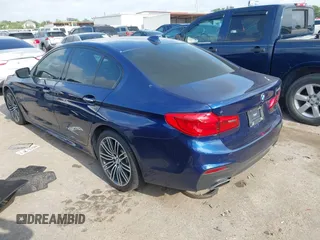 2017 BMW 5 Series 540i z VIN WBAJE5C33HG916583, wystawiony jako IAAI lot #42160663 z przebiegiem 60 441 mil mil oraz . Historia ofert i sprzedaży dostępna na DreamBid. Obrazek 3.