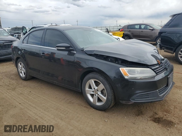 2014 Volkswagen Jetta TDI w/Premium with VIN 3VW3L7AJ9EM438697, listed as a Copart auction lot 57641645 with 191,231 mi miles and Salvage title. Bid and sale history available at DreamBid. Image 4.