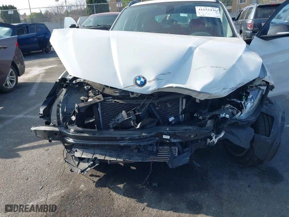 2014 BMW X1 xDrive28i with VIN WBAVL1C52EVY23658, listed as a IAAI auction lot 41153436 with 26,791 mi miles. Bid and sale history available at carsss.com. Image 6.