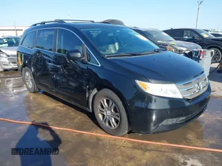2013 Honda Odyssey EX-L with VIN 5FNRL5H6XDB090768, listed as a IAAI auction lot 42008759 with 116,052 mi miles and . Bid and sale history available at carsss.com. Image 1.