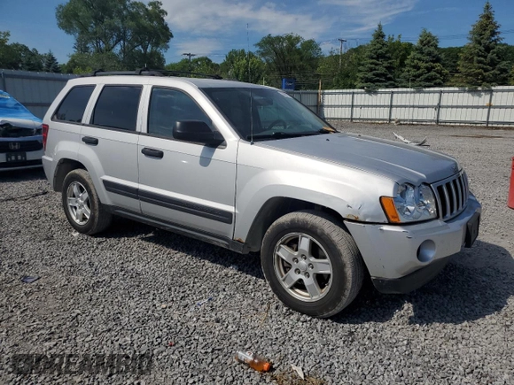 2005 Jeep Grand Cherokee Laredo with VIN 1J4GR48KX5C565762, listed as a Copart auction lot 63080115 with 122,349 mi miles and Salvage title. Bid and sale history available at DreamBid. Image 4.