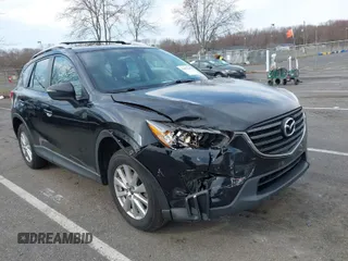 2016 Mazda CX-5 Sport with VIN JM3KE4BY7G0893578, listed as a IAAI auction lot 41853840 with 95,937 mi miles. Bid and sale history available at carsss.com. Image 1.