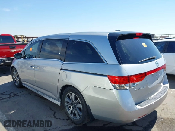 2014 Honda Odyssey Touring с VIN 5FNRL5H98EB070983, выставлен на аукционе IAAI как лот 42328380 с пробегом Не указан миль и . История ставок и продаж доступна на DreamBid. Изображение 3.