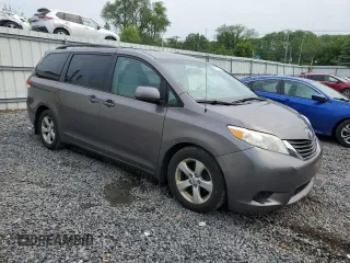 2011 Toyota Sienna LE AAS with VIN 5TDKK3DC0BS069554, listed as a Copart auction lot 60604095 with 188,997 mi miles and Clean title. Bid and sale history available at DreamBid. Image 4.