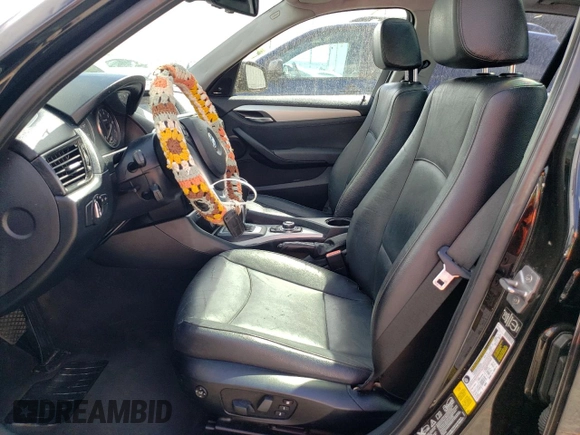 2014 BMW X1 xDrive28i z VIN WBAVL1C5XEVY16263, wystawiony jako Copart lot #52242225 z przebiegiem 154 951 mil mil oraz Szkoda całkowita • Salvage title. Historia ofert i sprzedaży dostępna na DreamBid. Obrazek 7.