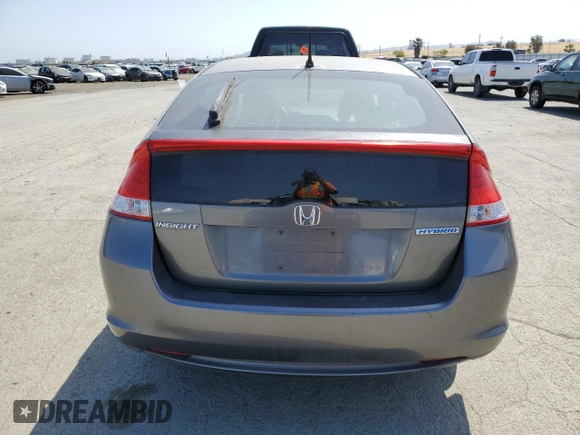 2010 Honda Insight EX with VIN JHMZE2H7XAS021268, listed as a Copart auction lot 54179245 with 211,561 mi miles and Salvage Title. Bid and sale history available at DreamBid. Image 6.