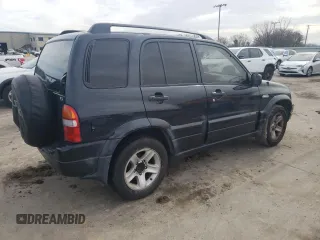 2003 Suzuki Grand Vitara z VIN JS3TE62V834101506, wystawiony jako Copart lot #47094765 z przebiegiem 240 778 mil mil oraz Szkoda całkowita • Salvage title. Historia ofert i sprzedaży dostępna na DreamBid. Obrazek 3.