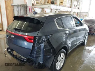 2019 Kia Sportage LX with VIN KNDPM3AC6K7591295, listed as a IAAI auction lot 41870202 with 54,246 mi miles. Bid and sale history available at carsss.com. Image 4.