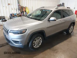 2019 Jeep Cherokee Latitude z VIN 1C4PJMCB0KD122398, wystawiony jako IAAI lot #41798728 z przebiegiem 117 810 mil mil oraz . Historia ofert i sprzedaży dostępna na DreamBid. Obrazek 2.