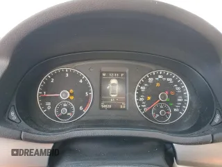 2014 Volkswagen Passat SE z VIN 1VWBN7A30EC022997, wystawiony jako Copart lot #57582285 z przebiegiem 94 920 mil mil oraz Szkoda całkowita • Salvage title. Historia ofert i sprzedaży dostępna na DreamBid. Obrazek 9.