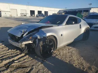2015 Nissan 370Z with VIN JN1AZ4EH2FM443464, listed as a Copart auction lot 83410654 with 116,692 mi miles and Salvage Title. Bid and sale history available at carsss.com. Image 1.