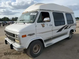 1995 Chevrolet Chevy Van z VIN 1GBEG25K1SF128372, wystawiony jako Copart lot #78600654 z przebiegiem 183 522 mil mil oraz Szkody całkowita. Historia ofert i sprzedaży dostępna na DreamBid. Obrazek 1.