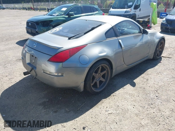 2003 Nissan 350Z Touring z VIN JN1AZ34E03T004458, wystawiony jako IAAI lot #42361684 z przebiegiem 147 847 mil mil oraz . Historia ofert i sprzedaży dostępna na DreamBid. Obrazek 4.