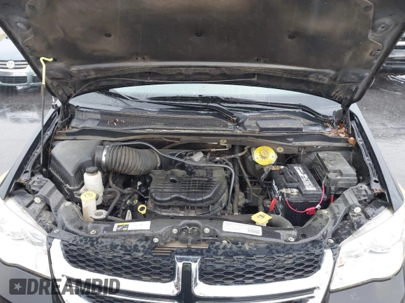 2015 Dodge Grand Caravan SXT with VIN 2C4RDGCG8FR556861, listed as a IAAI auction lot 42224948 with 110,797 mi miles and . Bid and sale history available at DreamBid. Image 10.
