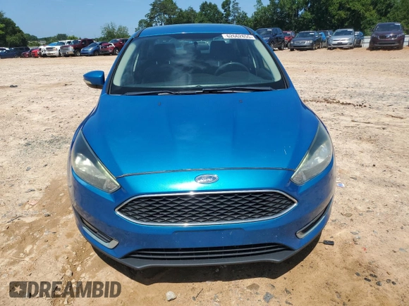 2015 Ford Focus SE with VIN 1FADP3F24FL200786, listed as a Copart auction lot 62662855 with 90,790 mi miles and Salvage title. Bid and sale history available at DreamBid. Image 5.