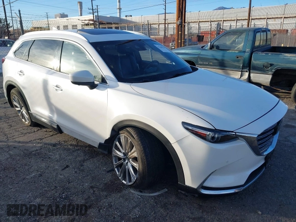 2021 Mazda CX-9 Signature with VIN JM3TCBEY6M0536883, listed as a IAAI auction lot 41388130 with 65,613 mi miles. Bid and sale history available at carsss.com. Image 1.