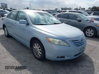 2007 Toyota Camry CE z VIN 4T1BE46K77U546061, wystawiony jako IAAI lot #41891280 z przebiegiem 136 220 mil mil oraz . Historia ofert i sprzedaży dostępna na DreamBid. Obrazek 1.