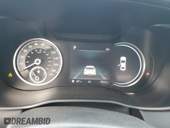 2023 Genesis G70 2.0T with VIN KMTG34TA5PU128224, listed as a Copart auction lot 82026383 with 7,311 mi miles and Salvage Title. Bid and sale history available at DreamBid. Image 9.