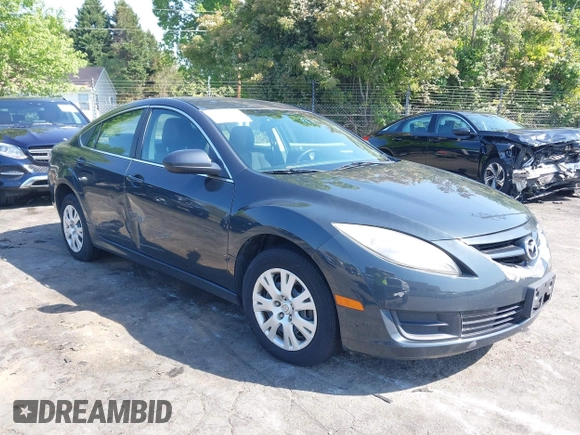 2012 Mazda 6 i Sport with VIN 1YVHZ8BH4C5M01305, listed as a IAAI auction lot 42032393 with 244,764 mi miles and . Bid and sale history available at DreamBid. Image 1.
