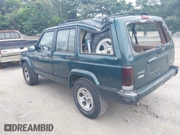 2000 Jeep Cherokee z VIN 1J4FT48S4YL265734, wystawiony jako IAAI lot #42556994 z przebiegiem 228 162 mil mil oraz . Historia ofert i sprzedaży dostępna na DreamBid. Obrazek 3.