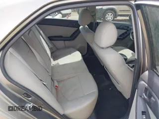 2012 Kia Forte EX with VIN KNAFU4A29C5574316, listed as a IAAI auction lot 42104534 with 195,993 mi miles. Bid and sale history available at carsss.com. Image 8.