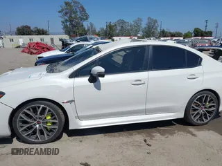 2019 Subaru WRX STI z VIN JF1VA2R6XK9814201, wystawiony jako IAAI lot #41641582 z przebiegiem 57 327 mil mil oraz . Historia ofert i sprzedaży dostępna na DreamBid. Obrazek 14.