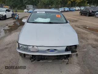 1994 Ford Taurus GL z VIN 1FALP52U0RA251491, wystawiony jako Copart lot #71640224 z przebiegiem Nie podano mil oraz Szkoda całkowita • Salvage title. Historia ofert i sprzedaży dostępna na DreamBid. Obrazek 5.