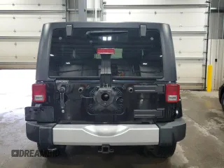 2013 Jeep Wrangler Sahara z VIN 1C4AJWBG5DL566559, wystawiony jako Copart lot #54823405 z przebiegiem 134 099 mil mil oraz Szkoda całkowita • Salvage title. Historia ofert i sprzedaży dostępna na DreamBid. Obrazek 6.