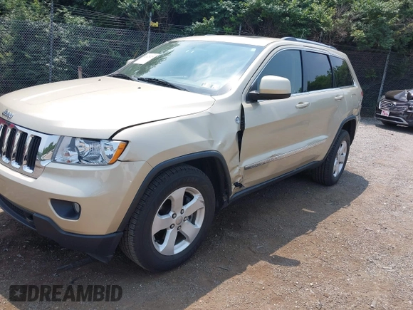 2011 Jeep Grand Cherokee Laredo with VIN 1J4RR4GG0BC713919, listed as a IAAI auction lot 42425229 with 139,379 mi miles and . Bid and sale history available at DreamBid. Image 2.