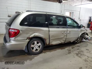 2005 Dodge Caravan SXT with VIN 2D4GP44L65R438530, listed as a Copart auction lot 63415955 with 220,852 mi miles and Salvage title. Bid and sale history available at DreamBid. Image 3.