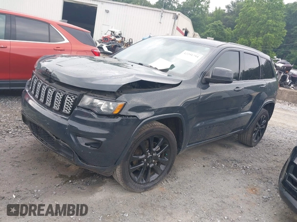 2018 Jeep Grand Cherokee Upland with VIN 1C4RJFAG4JC249243, listed as a IAAI auction lot 42291794 with 194,501 mi miles and . Bid and sale history available at DreamBid. Image 2.