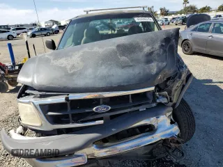 1998 Ford F-150 с VIN 1FTZX18W4WKA79557, выставлен на аукционе Copart как лот 48406375 с пробегом 192 577 миль миль и Списание • Salvage title. История ставок и продаж доступна на DreamBid. Изображение 5.