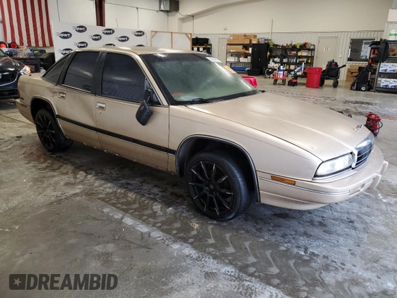 1993 Buick Regal Custom with VIN 2G4WB54L4P1411904, listed as a Copart auction lot 56564455 with 112,248 mi miles and Salvage title. Bid and sale history available at DreamBid. Image 4.
