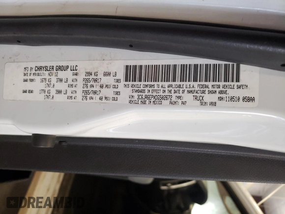 2013 Ram 1500 SLT with VIN 3C6JR6EPXDG502672, listed as a Copart auction lot 70825504 with 142,054 mi miles and Salvage title. Bid and sale history available at DreamBid. Image 12.