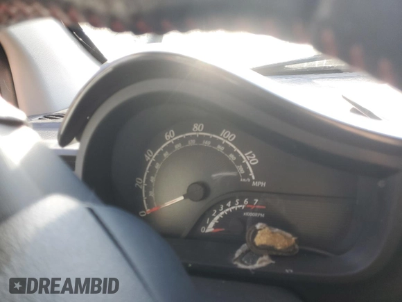 2013 Scion iQ with VIN JTNJJXB00DJ022017, listed as a Copart auction lot 82717994 with Not provided miles and Salvage title. Bid and sale history available at DreamBid. Image 9.