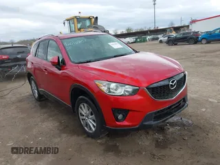 2014 Mazda CX-5 Touring z VIN JM3KE2CY3E0424892, wystawiony jako IAAI lot #42016801 z przebiegiem 173 350 mil mil oraz . Historia ofert i sprzedaży dostępna na DreamBid. Obrazek 1.