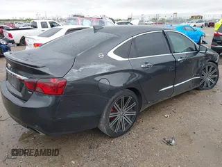 2015 Chevrolet Impala LTZ with VIN 1G1155SL8FU135991, listed as a IAAI auction lot 41895946 with 150,332 mi miles and . Bid and sale history available at DreamBid. Image 4.