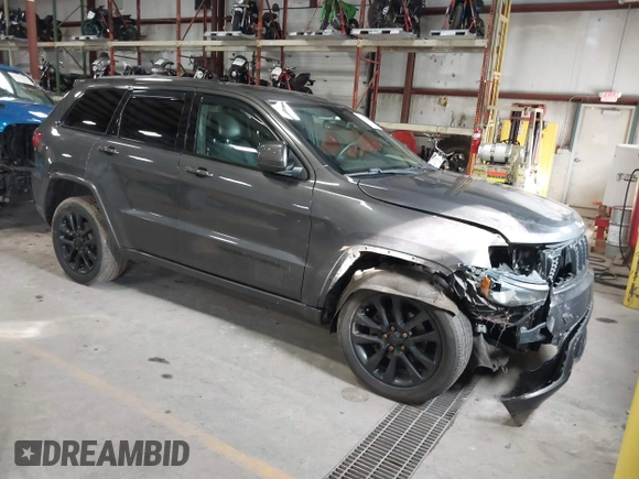 2018 Jeep Grand Cherokee Laredo E with VIN 1C4RJFAG5JC343101, listed as a IAAI auction lot 41211158 with 105,886 mi miles. Bid and sale history available at carsss.com. Image 1.