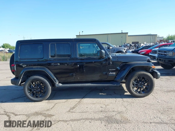 2023 Jeep Wrangler Sahara z VIN 1C4JJXP60PW627051, wystawiony jako IAAI lot #42290712 z przebiegiem 28 269 mil mil oraz . Historia ofert i sprzedaży dostępna na DreamBid. Obrazek 14.